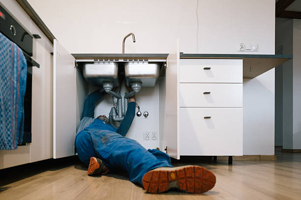 Professional Emergency Plumber technician working in Glyndon, MN